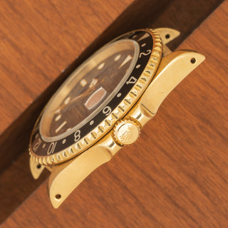 Rolex GMT Master II 16718 w/Black "Gilt Dial"