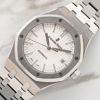 Angled shot highlighting the octagonal bezel with exposed screws and sharp factory case lines on a Royal Oak 15450ST
