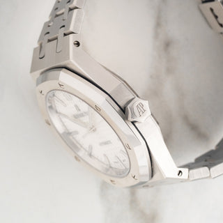 Side profile view showcasing the hexagonal winding crown and unpolished case lines on an AP Royal Oak 15450ST
