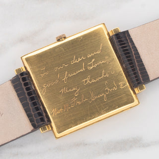 Personalized hand engraving from Henry Ford II to Tom Murphy on the 18k gold caseback of an Audemars Piguet Ultra-Thin
