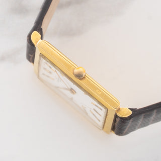 Side profile view showcasing the ultra-thin 4mm square case thickness and crown of an Audemars Piguet dress watch