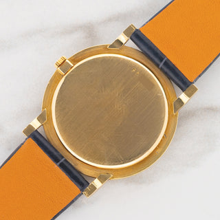 The clean 18k yellow gold snap-on caseback and sharp lug undersides on an unpolished Audemars Piguet 5043