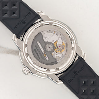 Sapphire display caseback showing the in-house caliber 1151 automatic movement and rotor on a Blancpain Tribute To Fifty Fathoms