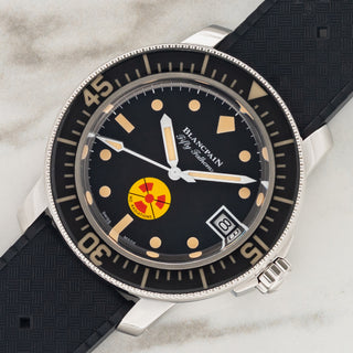 Angled view highlighting the domed sapphire crystal bezel insert and 40.3mm case of a Blancpain Tribute To Fifty Fathoms No Rad