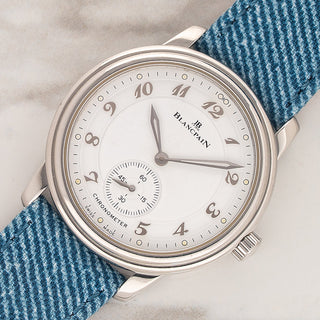 Angled view highlighting the double-stepped bezel and curved Breguet numerals on a Blancpain Villeret 7002