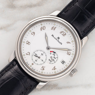 Angled shot highlighting the double-stepped bezel and raised Breguet numerals on a Blancpain Villeret 1106 Ultra-Slim