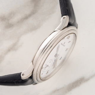 Side profile view showcasing the ultra-slim stainless steel case profile and stepped bezel of a Blancpain 1106