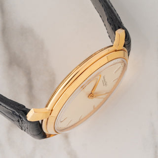Side view displaying the unpolished 18k pink gold case lines and bezel profile on an IWC Shark Fin