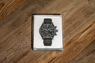 Framed black and white technical illustration artwork gifted with the IWC Pilot Chronograph Tribute to 3705