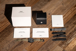 Complete full set set of the IWC Pilot Chronograph Tribute to 3705 including original presentation box, booklets, and 2022 warranty card