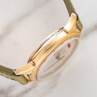 Side profile view displaying the elegant case architecture and lug profile on a 1950s LeCoultre Powermatic