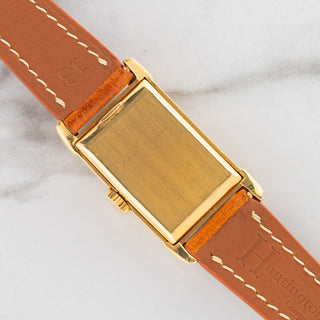 The solid 18k yellow gold rectangular caseback and lug undersides on a vintage Patek Philippe reference 2417J