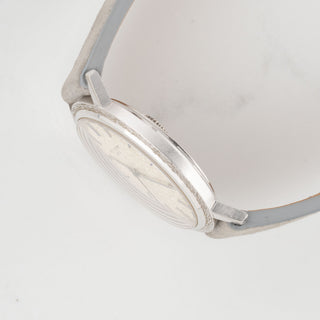 Side profile view showcasing the slim case design and clean edges of a 1970 white gold Patek Philippe Calatrava