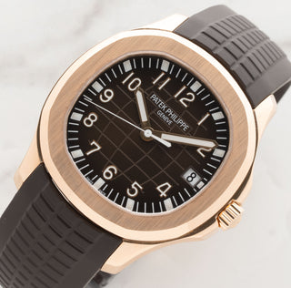 Angled shot highlighting the warm 18k rose gold case finish and brown grenade dial of the Patek Philippe Aquanaut 5167R