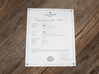 Official Patek Philippe Extract from the Archives paperwork confirming details for this vintage Calatrava 3569