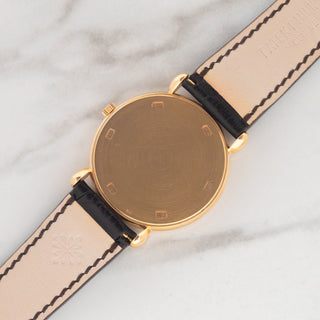 The solid 18k rose gold caseback displaying crisp factory hallmarks and lug undersides on an unpolished Patek Philippe 3820R