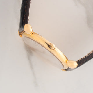 Side profile view showcasing the ultra-slim 18k rose gold case profile, winding crown, and teardrop lugs on a Patek Philippe 3820R