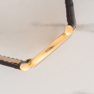 Side view displaying the unpolished 18k rose gold case profile and elegant teardrop lug design on a Patek Philippe Calatrava