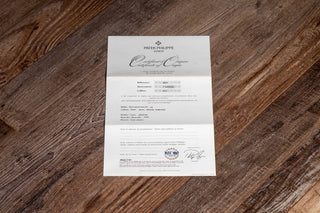 Original open Patek Philippe warranty paperwork accompanying a reference 5022P in platinum