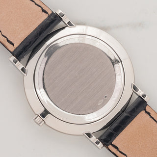 The solid platinum caseback showing crisp hallmarks and lug undersides on a Patek Philippe Calatrava 5022P
