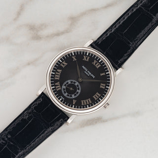 Platinum Patek Philippe Calatrava 5022P with black guilloché dial on a black alligator strap at Collectors Corner NY