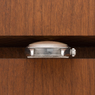 Horizontal profile detail of the Rolex Oysterdate 6466 stainless steel case and smooth bezel