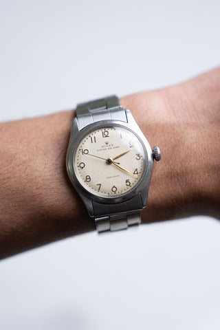 On-wrist view of the vintage Rolex Air King 4499, showcasing its profile and size at a luxury watch boutique in NYC