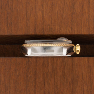 Horizontal profile view displaying the unpolished case side and sharp lug edges of a vintage Rolex Datejust
