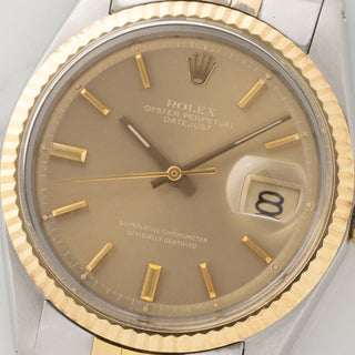 Macro close-up shot of the rare Havana brown baby ghost tropical dial and warm tritium lume plots on a Rolex 1601