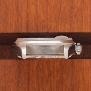 Horizontal case profile showing the clear U64X serial number engraving between the lugs of a Rolex 16200