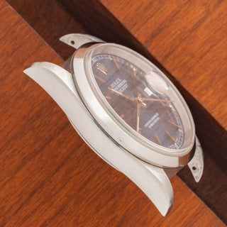 Angled top view highlighting the thick, sharp lug contours and smooth bezel on a 1998 Rolex Datejust 16200