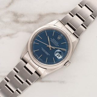 1998 Rolex Datejust 16200 stainless steel watch with mint blue sunburst dial on Oyster bracelet at Collectors Corner NY