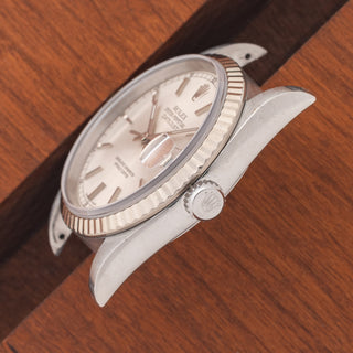 Angled top perspective showcasing the case lines, sapphire crystal, and signed winding crown on a 1999 Rolex Datejust 16234