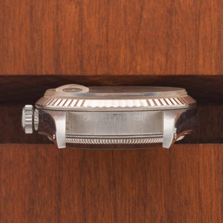 Horizontal case profile showing the crisp fluted bezel and clear 16234 reference number engraving between the lugs