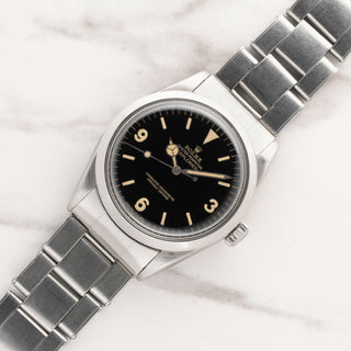 Vintage 1967 Rolex Explorer 1016 with glossy black gilt dial and stretch rivet bracelet at Collectors Corner New York