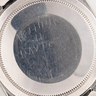 Inside view of the Rolex Oyster caseback showing the 1016 reference engraving and 1965 date stamp
