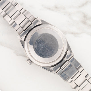 Exterior view of the stainless steel Oyster caseback attached to a stretch rivet bracelet on a Rolex Explorer 1016