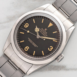 Top view perspective of a 1965 Rolex Explorer 1016 with tropical gilt dial and stretch rivet Oyster bracelet