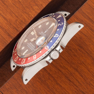 Angled top view highlighting the well-preserved lug lines and matte dial on a vintage Rolex GMT-Master