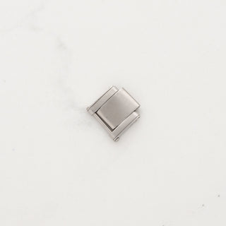 An authentic vintage stainless steel Rolex oyster bracelet spare link