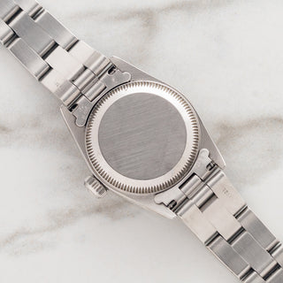 Rolex Oyster Perpetual 67180 "White Roman" - (26mm) Ladies  - Papers
