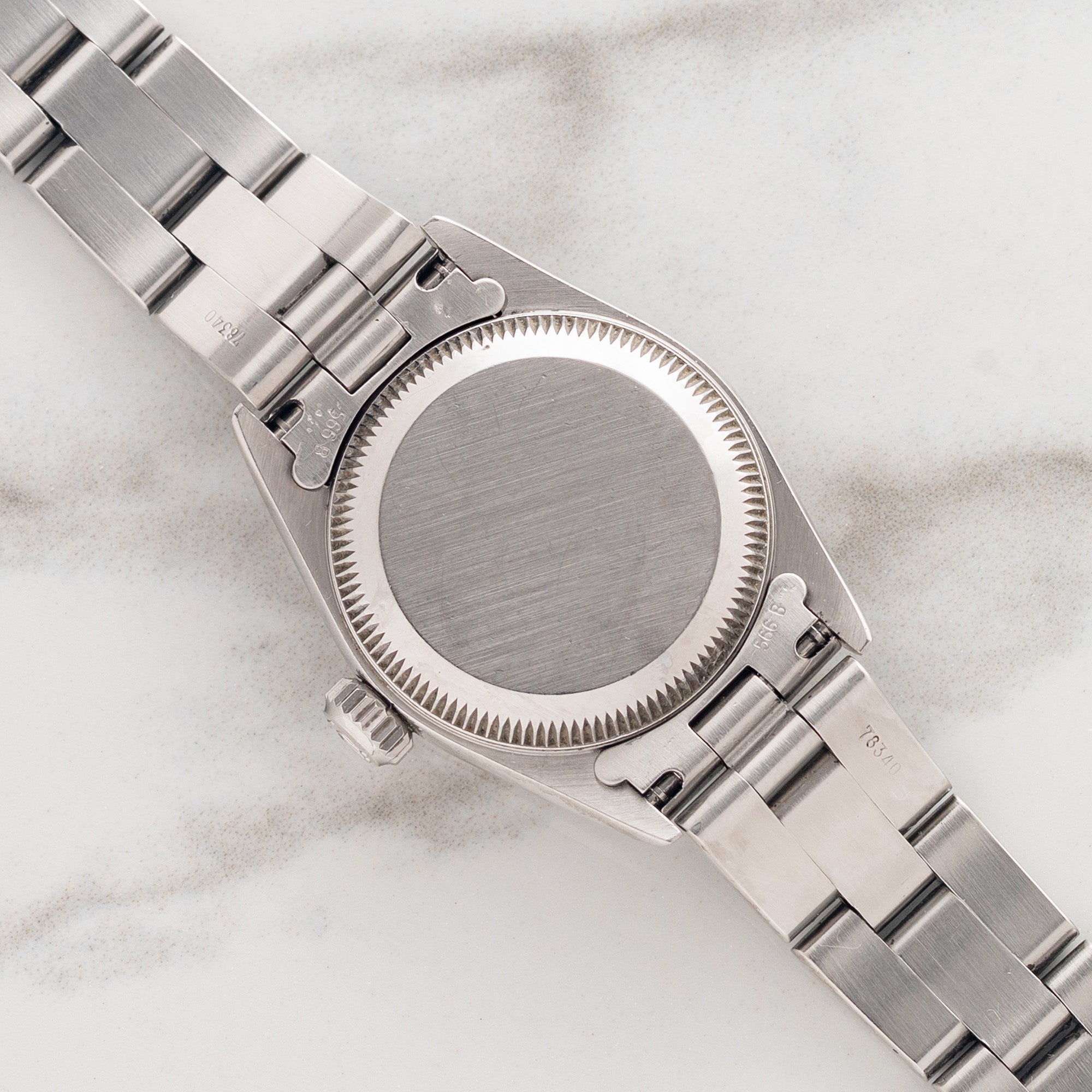 Rolex Oyster Perpetual 67180 "White Roman" - (26mm) Ladies  - Papers