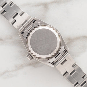 Rolex Oyster Perpetual 67180 "White Roman" - (26mm) Ladies  - Papers