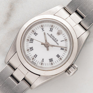 Rolex Oyster Perpetual 67180 "White Roman" - (26mm) Ladies  - Papers