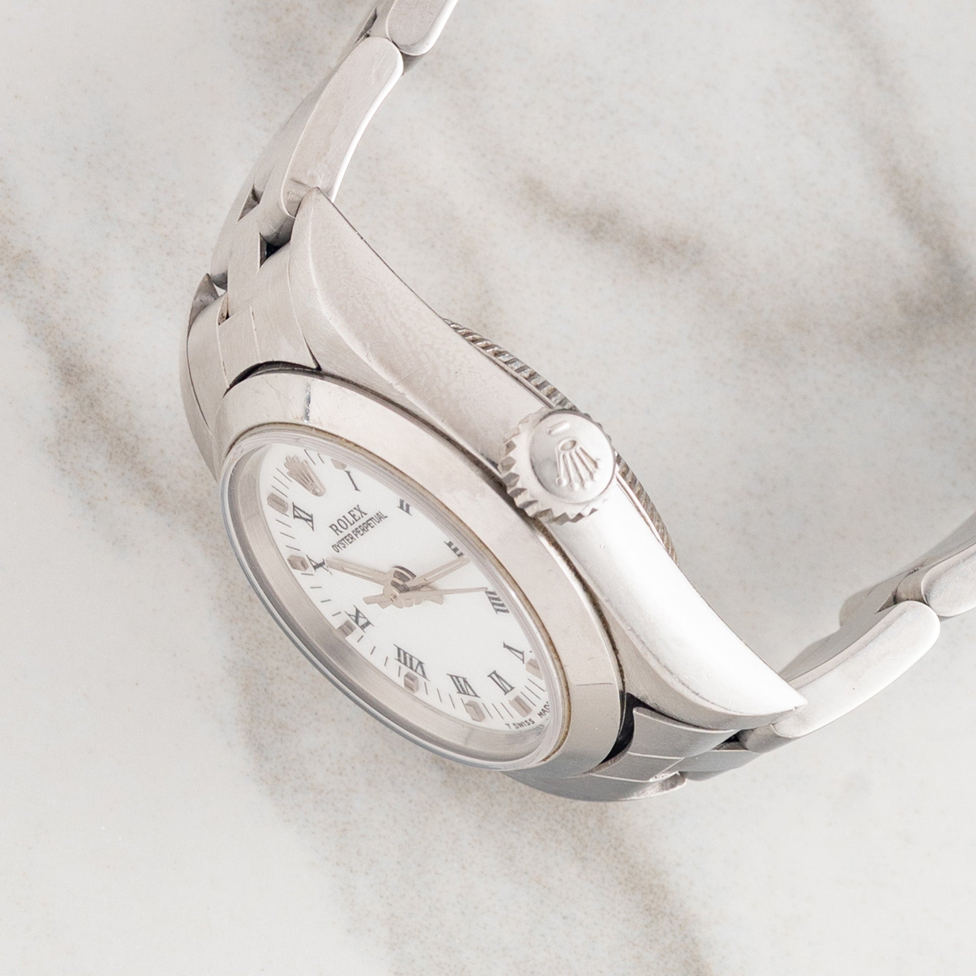 Rolex Oyster Perpetual 67180 "White Roman" - (26mm) Ladies  - Papers