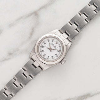Rolex Oyster Perpetual 67180 "White Roman" - (26mm) Ladies  - Papers