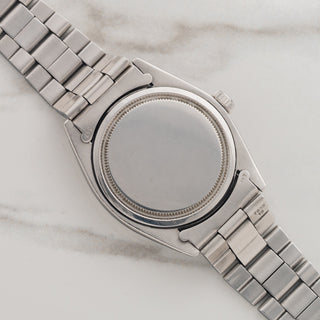 The clean stainless steel Oyster caseback and brushed lug undersides on a vintage Rolex Oyster Precision 6426