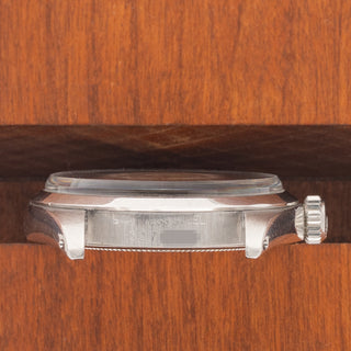 Horizontal case profile showing the clear serial number engraving between the lugs of a 1974 Rolex Oyster Precision