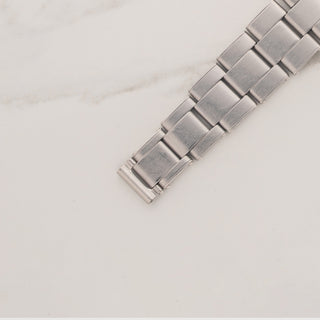 Top view displaying the stainless steel rivet Oyster bracelet links on a Rolex Oysterdate Precision