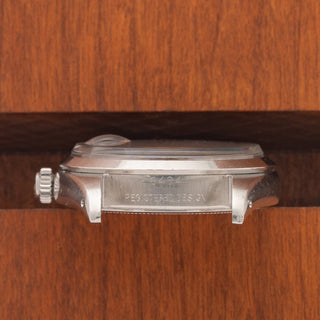 Horizontal case profile showing the clear 6494 reference number engraving between the lugs